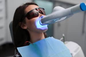 Woman getting teeth whitening in Houston